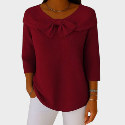 Suéter con lazo y escote redondo